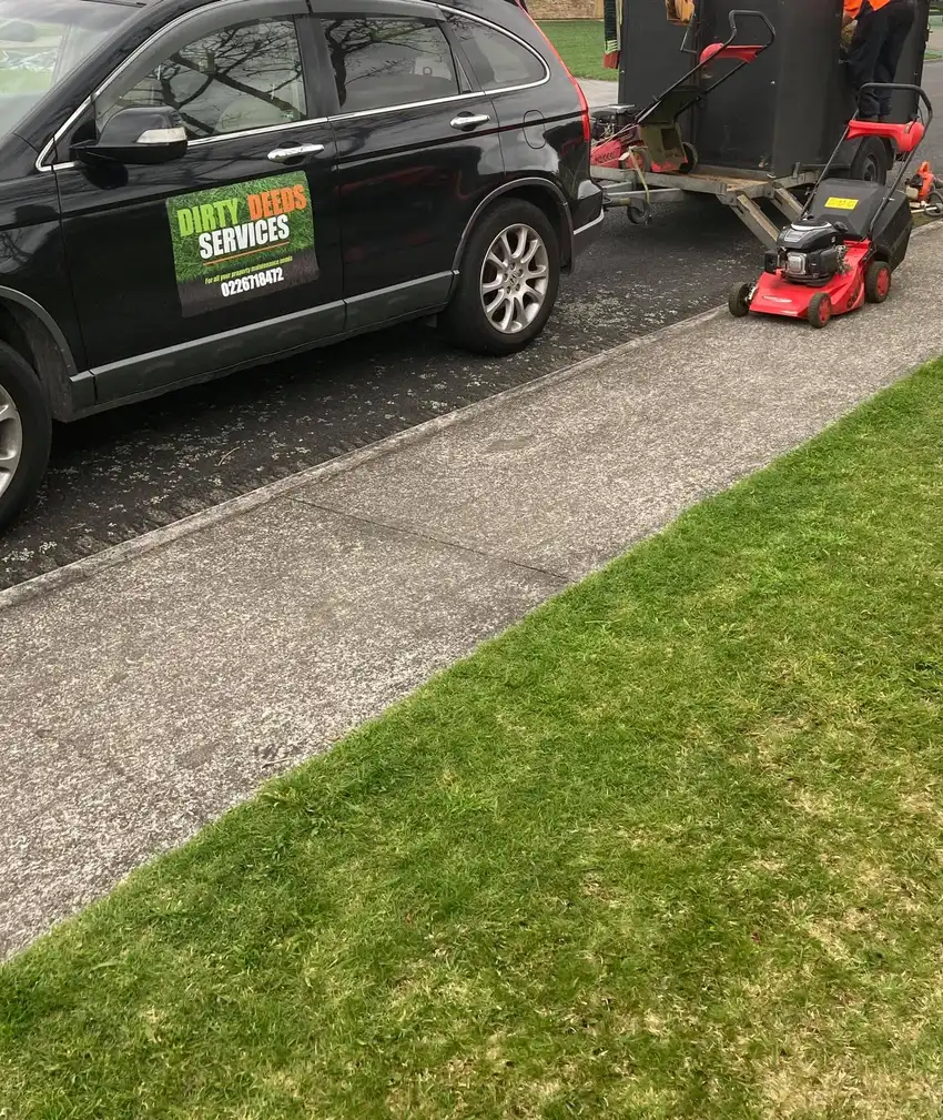 Dirty Deeds Services truck and trailer out on a job in the Waikato