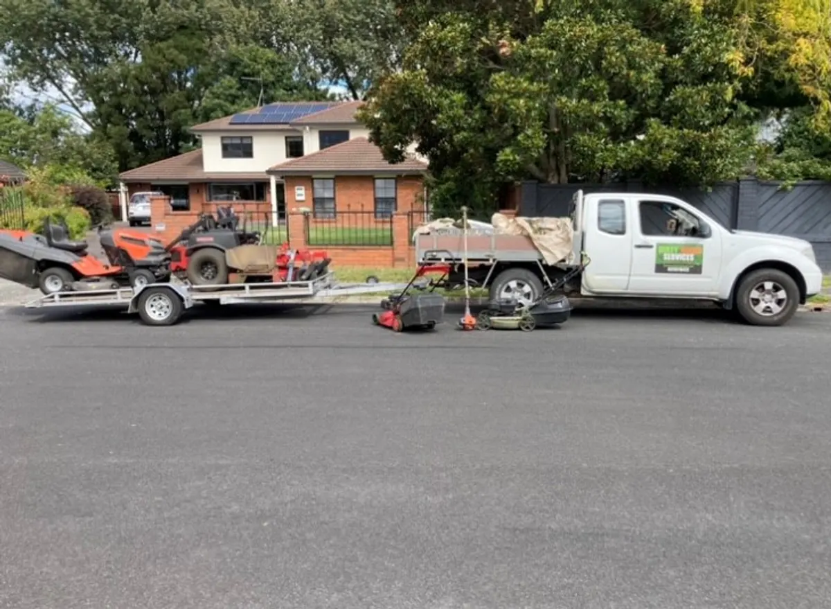 Dirty Deeds Services lawn mowing equipment