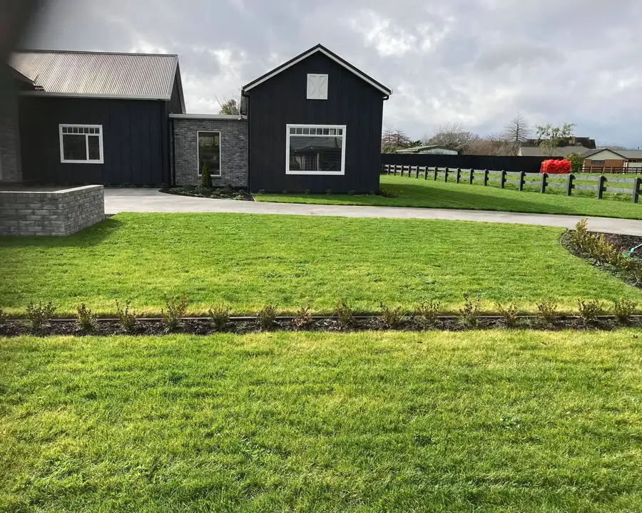 Residential lawn mowing at a home in Hamilton