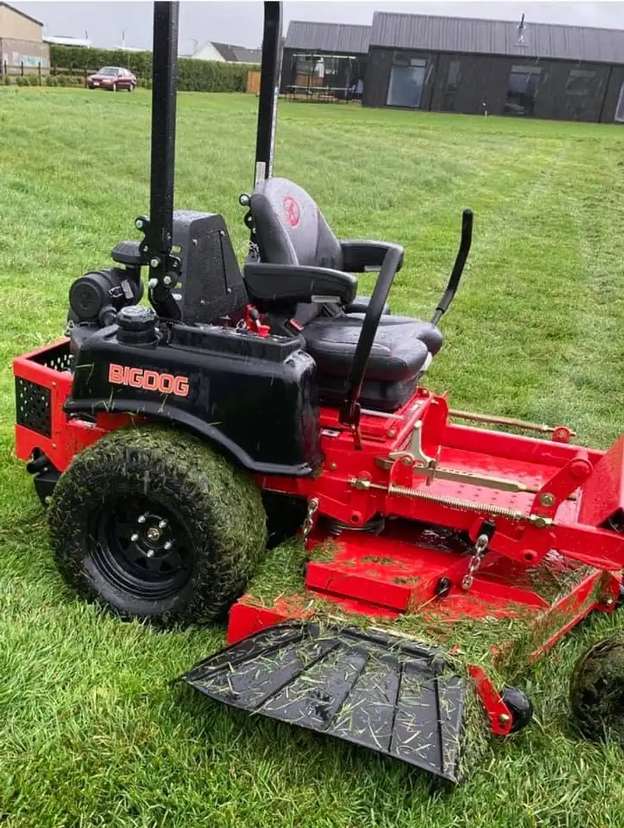 Zero-turn ride-on mower in action in Hamilton